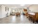 Open concept room featuring a dining area, seating area and kitchen at 9214 N 54Th Ave, Glendale, AZ 85302