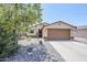 Charming single-story home featuring a well-maintained yard and attached two-car garage at 941 E Desert Moon Trl, San Tan Valley, AZ 85143