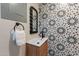 Close up view of a renovated bathroom featuring unique tile work and modern fixtures at 1005 N Granite Reef Rd, Scottsdale, AZ 85257