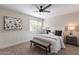 Cozy primary bedroom with a ceiling fan and an abundance of light at 1005 N Granite Reef Rd, Scottsdale, AZ 85257