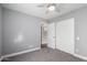 Bedroom with closet, neutral color palette, and plush carpet at 1055 E Ingram St, Mesa, AZ 85203