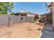 Wide backyard with block fence, and covered patio; great for entertaining or relaxing at 14420 N 44Th Dr, Glendale, AZ 85306