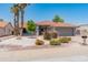 Charming single-story home featuring desert landscaping, a tile roof, and a two-car garage at 14420 N 44Th Dr, Glendale, AZ 85306
