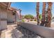 Inviting front yard with lush plants, decorative rock, a stone walkway, and a patriotic American flag displayed at 14420 N 44Th Dr, Glendale, AZ 85306