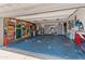Spacious garage with ample storage, shelving, and a well-organized layout; versatile space for parking and projects at 14420 N 44Th Dr, Glendale, AZ 85306