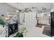 Bright kitchen features tile floors, white cabinets, modern appliances, and an eat-in area at 14420 N 44Th Dr, Glendale, AZ 85306