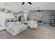 Bright, open-concept living area with cozy seating, modern decor, and seamless flow to the kitchen at 14420 N 44Th Dr, Glendale, AZ 85306