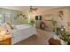 Cozy main bedroom with soft carpet, neutral tones, ceiling fan, and natural light at 14420 N 44Th Dr, Glendale, AZ 85306