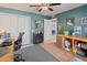Spacious office area with built-in storage solutions, natural light, and comfortable work environment at 14420 N 44Th Dr, Glendale, AZ 85306