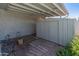 Backyard storage shed with rock and paver landscaping, providing ample outdoor storage at 14420 N 44Th Dr, Glendale, AZ 85306