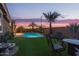 Backyard featuring a pool and lounge area at 17866 W Lilac St, Goodyear, AZ 85338