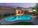 Inviting backyard featuring a pool and patio area for outdoor entertaining at 17866 W Lilac St, Goodyear, AZ 85338