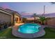 Backyard pool area with privacy wall at 17866 W Lilac St, Goodyear, AZ 85338