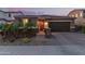 Charming single-story home featuring a well-kept yard, private front gate, and a two-car garage at 17866 W Lilac St, Goodyear, AZ 85338
