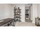 Home office with a desk, bookshelf and an entry to another room at 17866 W Lilac St, Goodyear, AZ 85338