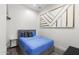 This bright bedroom offers a full-sized bed and modern decor at 1807 E Campbell Ave, Phoenix, AZ 85016