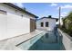 Beautiful backyard pool with modern design and tile, perfect for relaxation and entertainment at 1807 E Campbell Ave, Phoenix, AZ 85016