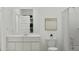 Bright bathroom featuring a toilet, vanity, and shower with a curtain in a modern setting at 20925 S 231St Way, Queen Creek, AZ 85142