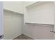 Walk-in closet with carpeted floor and white walls at 21120 E Creekside Dr, Queen Creek, AZ 85142
