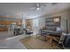 Spacious open-concept living space with a dining area, modern decor, and plenty of natural light at 21120 E Creekside Dr, Queen Creek, AZ 85142