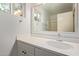 Bathroom featuring a large mirror and sink at 2161 E Harmony Cir, Mesa, AZ 85204