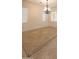 Open dining room with tile flooring, decorative floor trim and shutters on windows to let in natural light at 22903 N 39Th Ter, Phoenix, AZ 85050