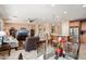 Open-concept living space with kitchen, dining, and living areas, perfect for entertaining at 26247 W Lone Cactus Dr, Buckeye, AZ 85396