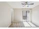 Bedroom with a ceiling fan and sliding glass doors leading to a balcony at 2815 N 52Nd St # 3, Phoenix, AZ 85008