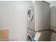 Stacked washer and dryer appliances in a laundry area at 2815 N 52Nd St # 3, Phoenix, AZ 85008