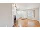 Inviting living room features a cozy fireplace, wood floors, and a bright window at 2815 N 52Nd St # 3, Phoenix, AZ 85008
