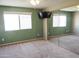 Spacious bedroom featuring a ceiling fan, sliding mirror closet doors, and bright windows at 30 E Brown Rd # 2113, Mesa, AZ 85201