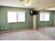 Spacious bedroom featuring a ceiling fan, sliding mirror closet doors, and bright windows at 30 E Brown Rd # 2113, Mesa, AZ 85201