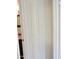 Classic white folding closet doors provide ample storage with paneled design at 30 E Brown Rd # 2113, Mesa, AZ 85201