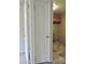 Solid door with painted trim highlights the interior space's neutral wall and tile flooring at 30 E Brown Rd # 2113, Mesa, AZ 85201