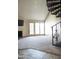 Living room featuring bright windows, neutral carpet, and a fireplace at 30 E Brown Rd # 2113, Mesa, AZ 85201
