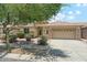 Charming single-story home featuring a tile roof and a well-maintained front yard with mature landscaping at 3310 W Chambers St, Phoenix, AZ 85041