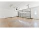 Spacious two-car garage with automatic door and ample room for vehicles at 3310 W Chambers St, Phoenix, AZ 85041