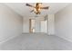 Spacious living room with soft carpeting and neutral colors for a relaxing ambiance at 3310 W Chambers St, Phoenix, AZ 85041