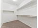 Walk-in closet with shelving offers substantial storage space for an organized wardrobe at 3310 W Chambers St, Phoenix, AZ 85041