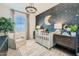 Charming Bedroom with a celestial-themed accent wall, and plush seating at 3340 S Lotus Ave, Mesa, AZ 85212