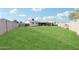 Large, grassy backyard offering plenty of space for recreation and entertainment at 3410 E Everett Dr, Phoenix, AZ 85032