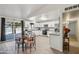 Bright eat-in kitchen with stainless appliances and slider leading to backyard at 3410 E Everett Dr, Phoenix, AZ 85032