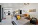Bright open concept home with living room open to kitchen and dining area at 3410 E Everett Dr, Phoenix, AZ 85032