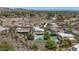 Aerial view of home with a pool and desert landscape at 3611 E Ahwatukee Dr, Phoenix, AZ 85044