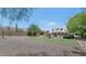 Backyard with artificial turf and desert landscape at 3611 E Ahwatukee Dr, Phoenix, AZ 85044