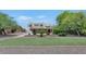 Backyard with a small lawn and a desert landscape at 3611 E Ahwatukee Dr, Phoenix, AZ 85044