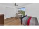 Bright bedroom featuring a ceiling fan, natural light, and mountain views at 3611 E Ahwatukee Dr, Phoenix, AZ 85044