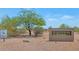 Equestrian Estates sign with a horse trails sign in the desert at 3611 E Ahwatukee Dr, Phoenix, AZ 85044