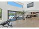 Bright and airy living space with seamless access to the outdoor pool and dining area at 3611 E Ahwatukee Dr, Phoenix, AZ 85044