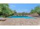 Outdoor pool featuring a small fountain with a desert landscape in the background at 3611 E Ahwatukee Dr, Phoenix, AZ 85044
